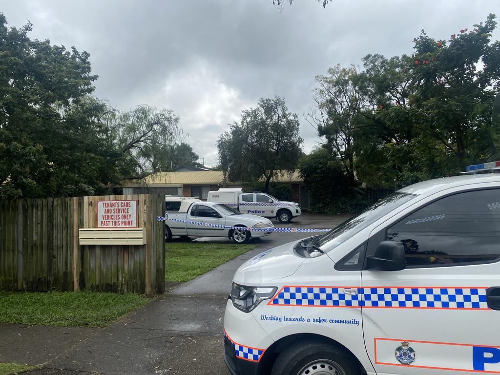 Police at the Augustus Street home in Kingston where the body of a man was found. Picture: Samantha Scott