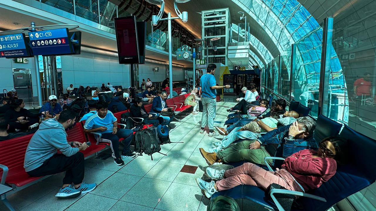 Passengers wait for their flights at the busy airport. Picture: AFP