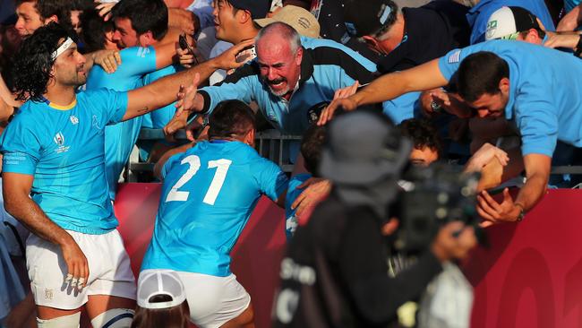 Uruguay celebrate with friends and family after winning the Rugby World Cup 2019 Group D game against Fiji.