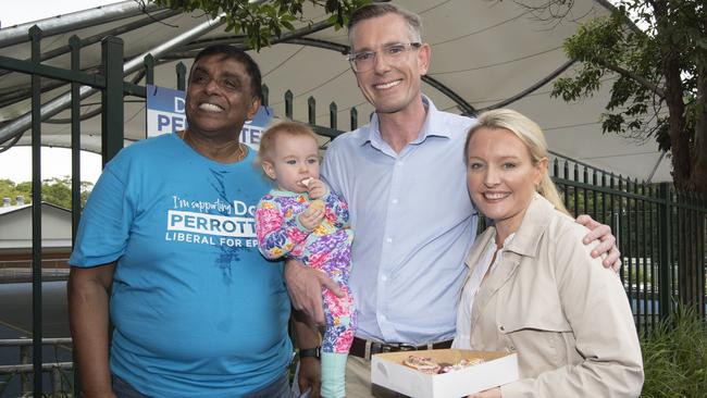 NSW Premier Dominic Perrottet and his wife Helen, and daughter Celeste casting their vote on Saturday. Picture: NCA Newswire/ Monique Harmer