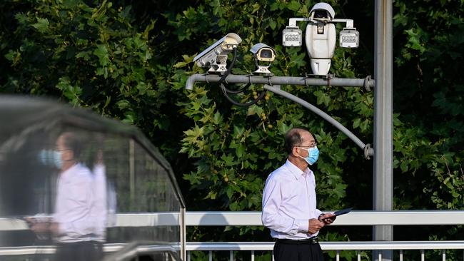 Closed circuit television surveillance cameras capture citizens’ every move in Beijing. Picture: AFP