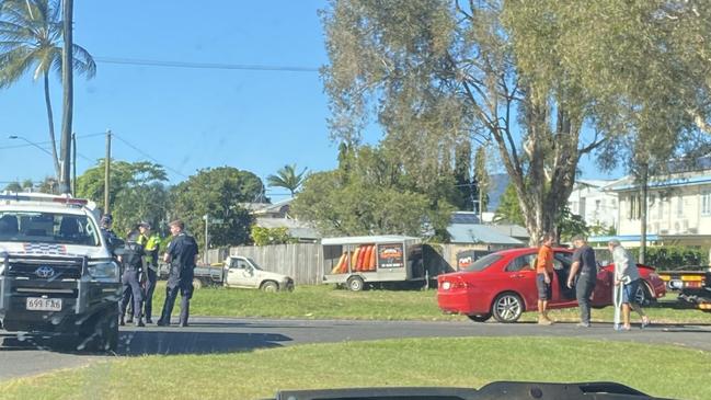 A red Honda Civic is towed from the scene of a traffic crash in Westcourt after colliding with a motorcycle. Picture: Supplied