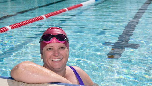 Kellie Darley christens the new Olympic-sized pool with some laps. Picture: Monique Harmer