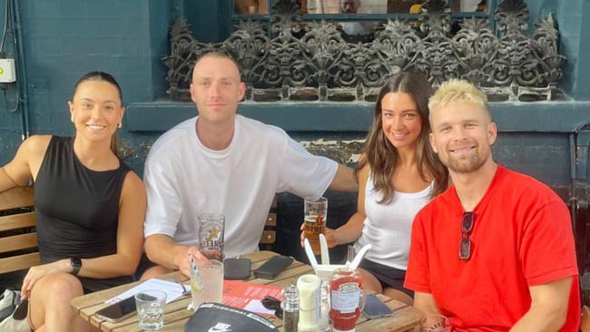 Saints pair Callum Wilkie and Dan Butler with their partners in London.