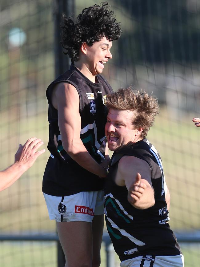 Omeo-Benambra’s Harry Warfe and Cody Graske celebrate in the last quarter with the Rangers well in front.