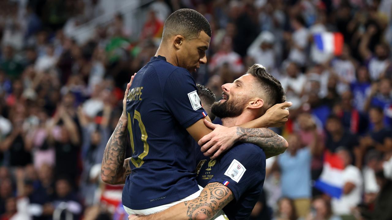 Kylian Mbappe and Olivier Giroud celebrate. (Photo by Alex Grimm/Getty Images)