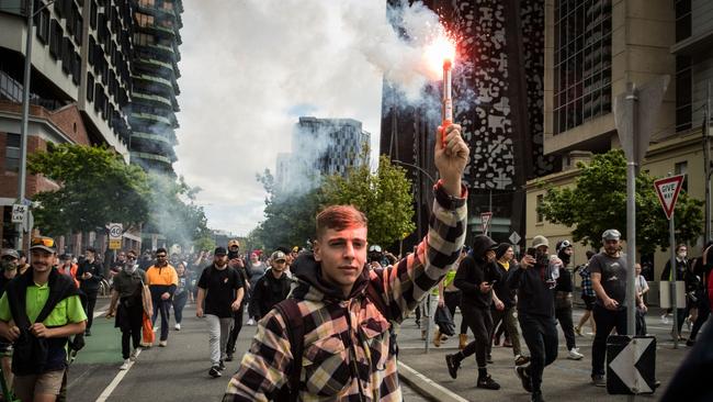 Protesters march through the streets in Melbourne over COVID-19 vaccine requirements. Picture: Getty Images