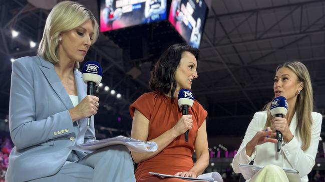 Emily Beaton in her role for Fox Netball, with Cath Cox and Bianca Chatfield. Picture: Supplied