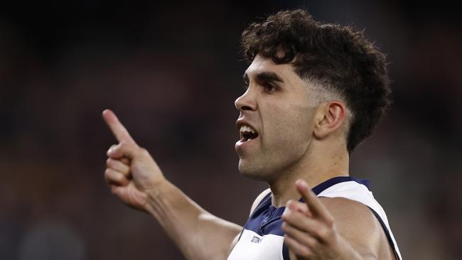 Tyson Stengle with a big celebration to the Cats faithful. Picture: Darrian Traynor/AFL Photos/Getty Images