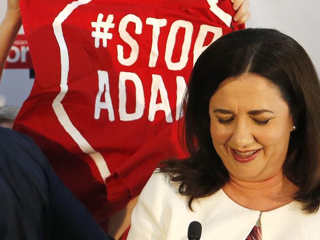 Adani Coal Mine protestors pictured as Queensland Premier Annastacia Palaszczuk announces the state election at the Darra Bowls Club, Brisbane 29th October 2017.  (AAP Image/Josh Woning)