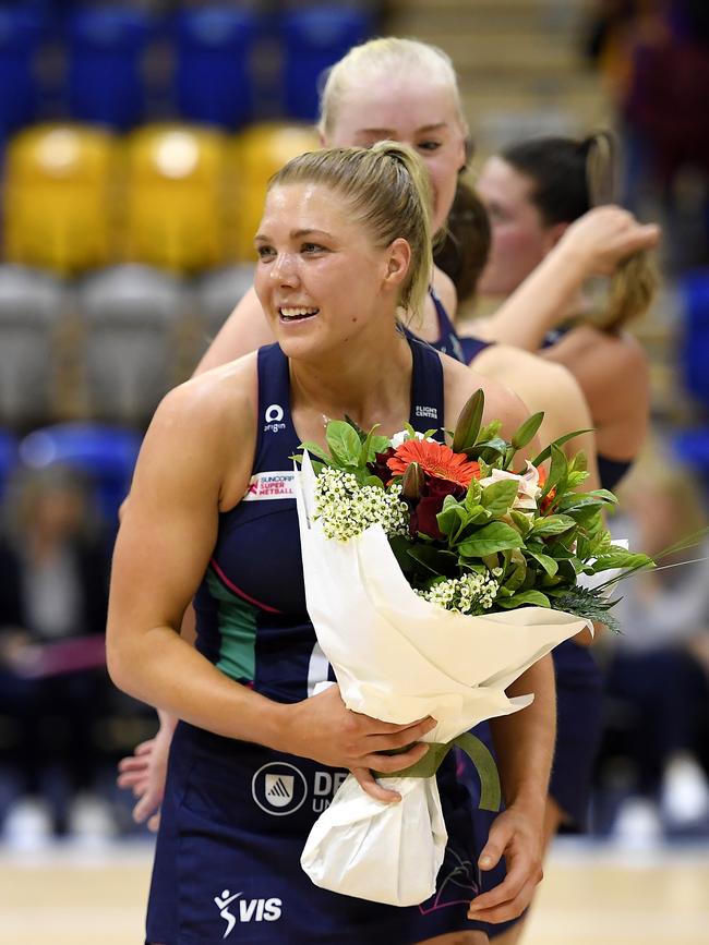 Vixens co-captain Kate Moloney celebrates her 100th match earlier this season. Picture: Albert Perez/Getty Images