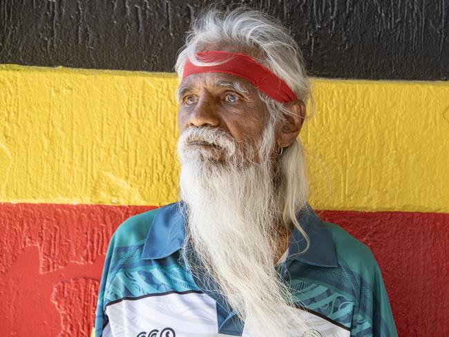 Mitchell Bulmer takes a moment after voting at the Indigenous community of Yarrabah in Far North Queensland. Picture: Brian Cassey