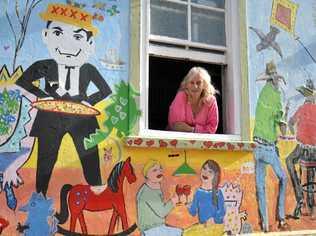 COLOURFUL PUB: Julie South at the Mulgildie Hotel, which is much more vibrant than when she first purchased it. Picture: Mackenzie Colahan