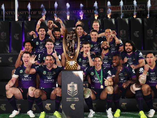 The victorious Melbourne Storm team captained by Cameron Smith celebrate defeating the North Queensland Cowboys in the 2017 NRL Grand Final at ANZ Stadium, Sydney. Picture. Phil Hillyard