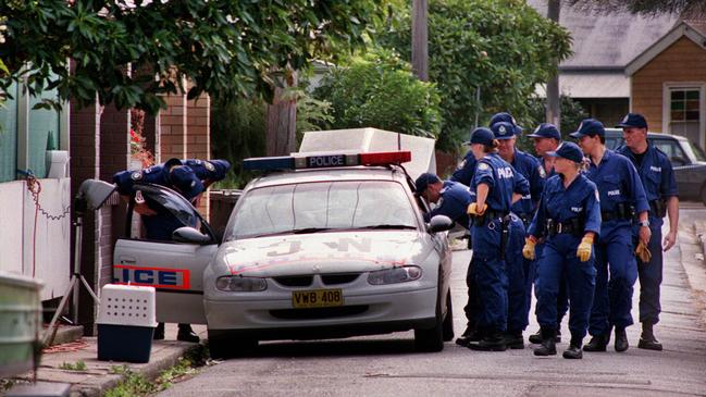 Police on scene the day after the bodies of two women were discovered bludgeoned to death in a Carrington home. Picture: Robert McKell.