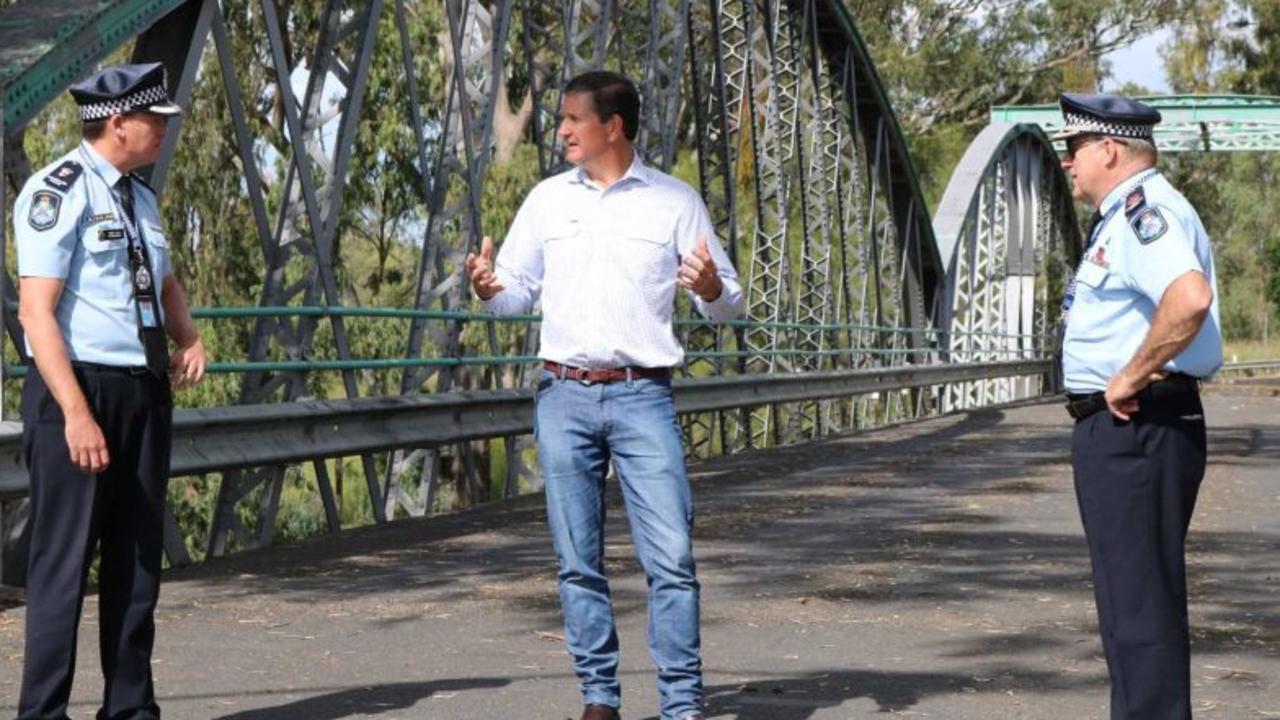 Discussing the border are (from left) Queensland Police Superintendent Mark Kelly (left) Goondiwindi Mayor Lawrence Springborg and Assistant Commissioner Mike Condon at Goondiwindi's old Macintyre Bridge.