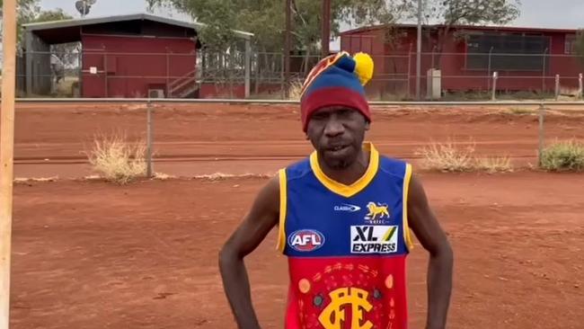 Eric West from the Kiwirrkurra community is cheering on the Brisbane Lions 700km west of Alice Spings. Photo: Brisbane Lions