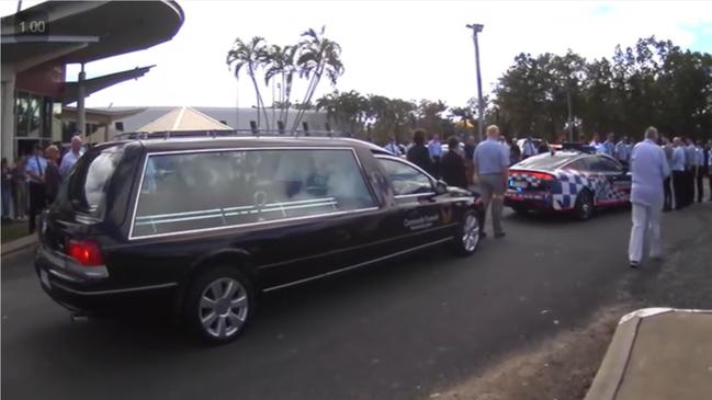 Attendees, including many QPS officers, formed a guard of honour following the service. Picture: Screenshot of livestream by Atherton Community Funerals