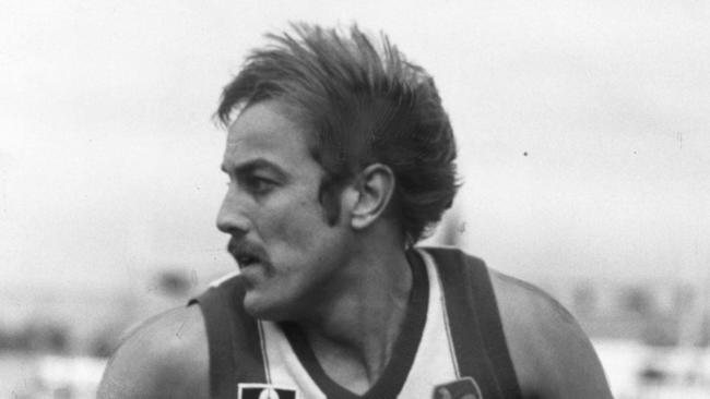Footballer Malcolm Blight playing for North Melbourne.