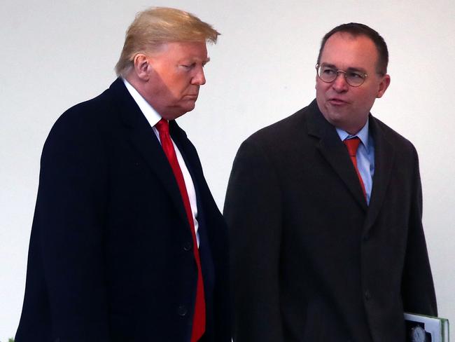 Mr Mulvaney with Mr Trump when he was his acting chief of staff a year ago. Picture: Getty