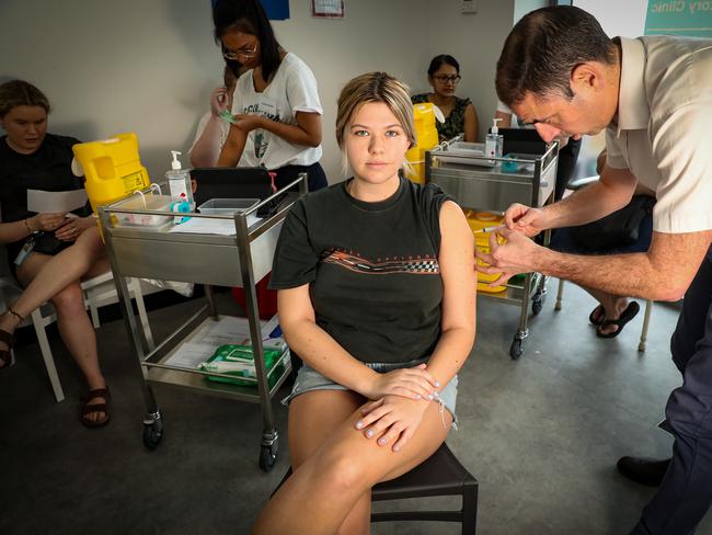 Elle Lockayne receives the COVID-19 vaccine East Victoria Park in Perth. Picture: Colin Murty