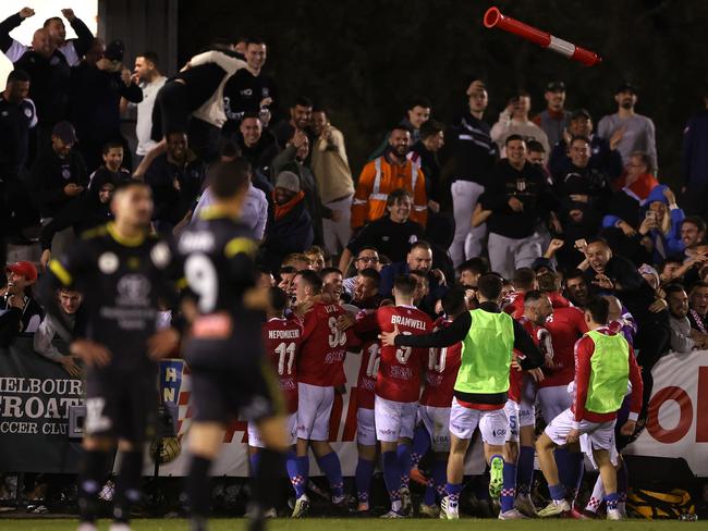 Melbourne Knights players celebrate in front of their fans. Pictures by Robert Cianfione