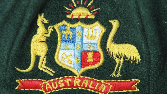 15 Jun 2000 : Australian Coat of Arms on Baggy Green cap. Australian cricket. emblem /hats sport uniforms hats