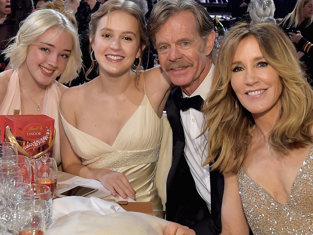 Felicity Huffman and husband William H Macy with their daughters Sofia and Georgia. Picture: Getty Images 