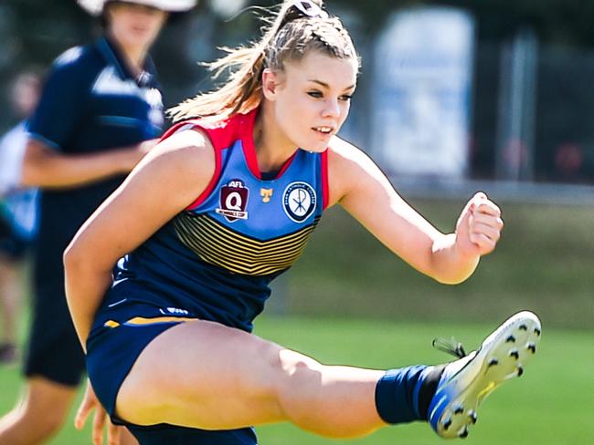 NQ AFL Championships at Murray. St AndrewsÃs Catholic College v Ryan Catholic College (red collar) Senior Female).