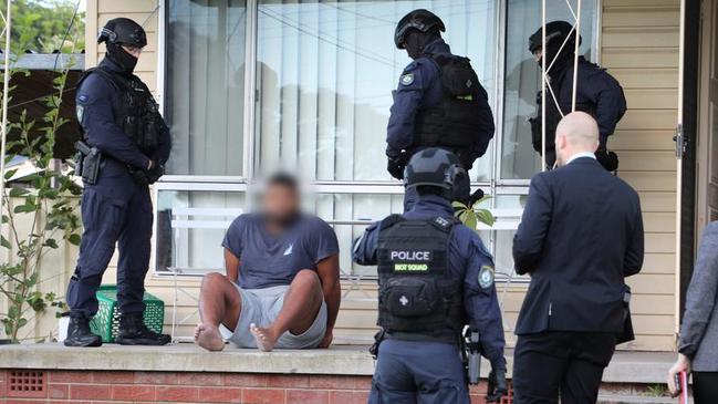 The latest severing of a body part comes after at least five people had fingers, toes and even teeth removed from victims after being kidnapped in February and March. Pictured is a man being arrested in relation to some of those incidents.