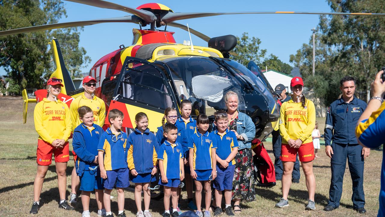 Mount Whitestone State School students with Beach to Bush surf life savers, and the Westpac helicopter team. PHOTO: ALI KUCHEL