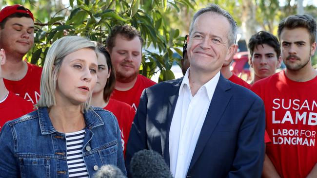 Bill Shorten soaks up the moment as Susan Lamb addresses a news conference after wining the Longman by-election. Picture: Liam Kidston