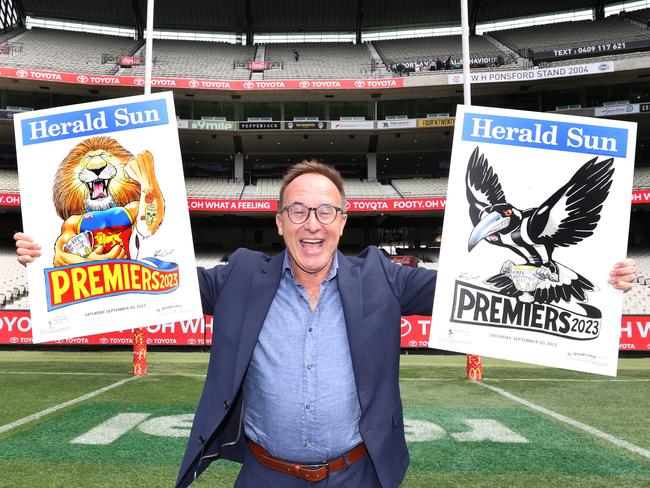 Award-winning cartoonist Mark Knight was joined by young fans of the two grand final teams at the MCG to reveal the posters.                     Picture: David Caird