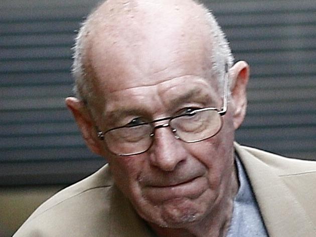 Roger Rogerson is led to the prison van at the end of another day of the modern rial of Jamie Gao. picture: John Appleyard