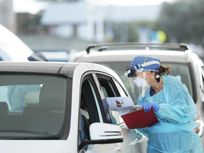 Medical professionals administer COVID-19 tests at the Bondi Beach drive-through coronavirus testing centre. Picture: Getty