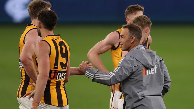 PERTH, AUSTRALIA - JULY 31: Alastair Clarkson, head coach of the Hawks celebrates with his players after winning the round nine AFL match between the Carlton Blues and the Hawthorn Hawks at Optus Stadium on July 31, 2020 in Perth, Australia. (Photo by Paul Kane/Getty Images)