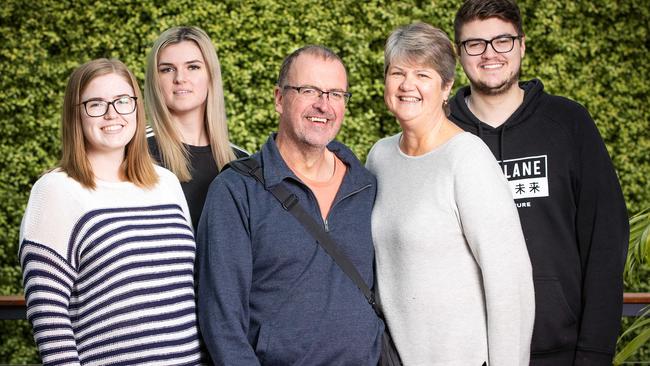 Andrew Conway, 55, with wife Leanne, 59, daughters Renee, 24, Dani, 26, and son Nick, 22, is awaiting a heart transplant after a series of cardiac arrests. Picture: Mark Stewart