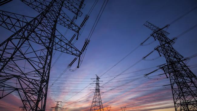 The silhouette of the evening electricity transmission pylon. Istock