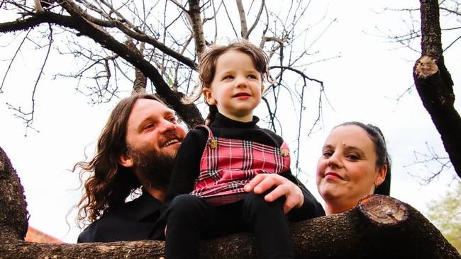 Andrew Purnell with his four-year-old daughter Isabella and fiance Cindy no longer have a GP after their local clinic closed. Picture: Supplied