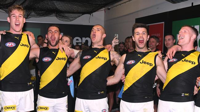 The Tigers celebrate their win. Picture: AAP