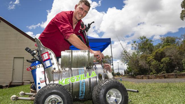 Jamie Kratzmann pours a beer from his Kegzilla kart after racing in the Greenmount Billy Kart Challenge, Saturday, November 23, 2024. Picture: Kevin Farmer