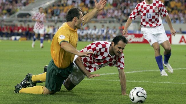 Josip Suminic brings down Socceroos striker Mark Viduka while representing Croatia at the FIFA World Cup in Germany in 2006 Group. Picture: Getty Images