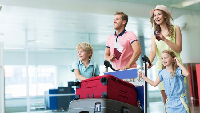 A young family at the airport waiting to go on holidays. Picture: iStock.