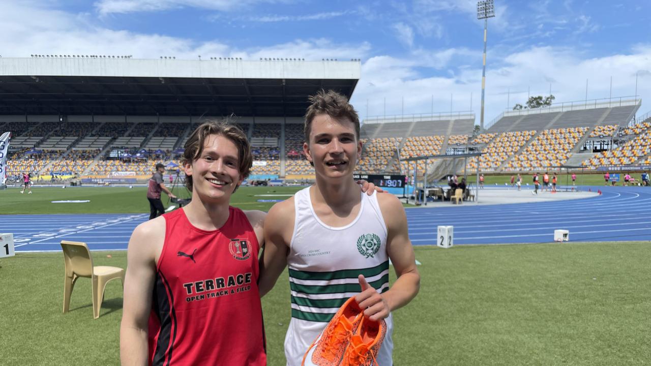 St Joseph’s Gregory Terrace’s Remy Tollenaere, left, with BBC's Callan Jensen who finished third in the open 400m hurdles.