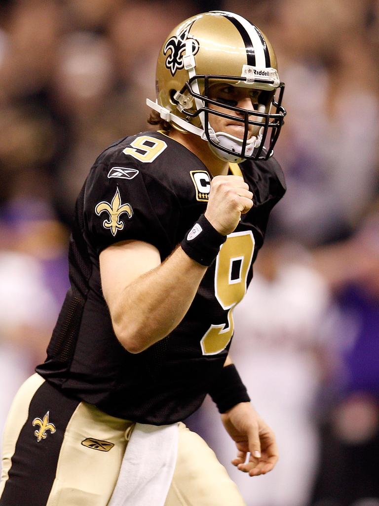 Drew Brees reacts after throwing a touchdown in the 2010 NFC Championship game.