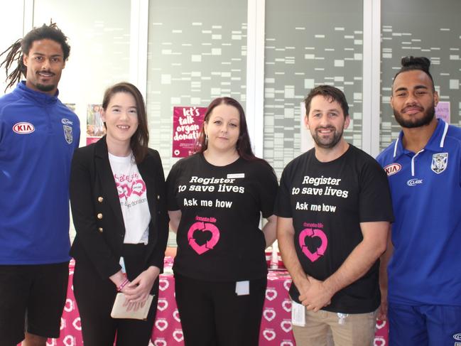 Canterbury Bulldogs players Jayden Okunbor and Christian Crichton with the Organ and Tissue team, Vanessa Palmer, Bessie Berberovic and Michael Boyle.