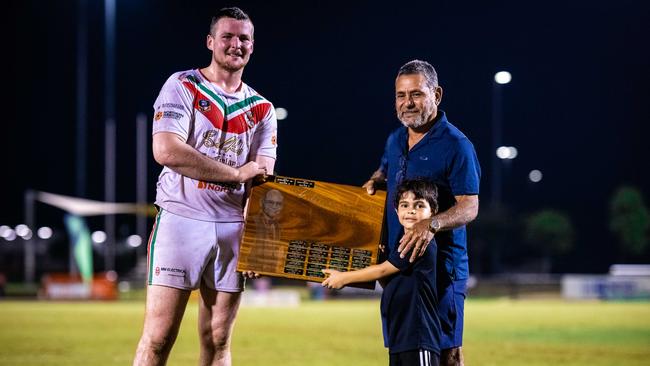 Nightcliff captain Zak Mott handed the Chico Motlop Shield by Mark Motlop after winning Round 11 of the 2023 NRL NT season. Picture: Patch Clapp / NRL NT