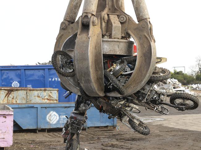 Monkey bike crushing at Sims Metal in Seaford. Picture: Lawrence Pinder