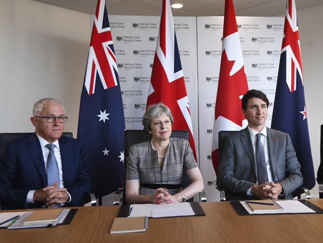 Prime Minister Malcolm Turnbull with British Prime Minister Theresa May and Canadian Prime Minister Justin Trudeau at the CHOGM meeting in London. Picture: AAP