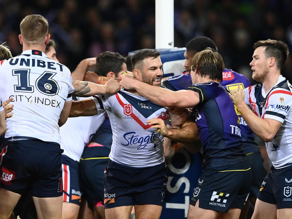 James Tedesco of the Roosters and Harry Grant of the Storm scuffle. Picture: Quinn Rooney/Getty Images